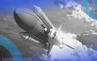 A space shuttle on rockets exits the atmosphere