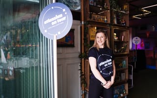 An Atlassian team member at an "Atlassian On Tour" event