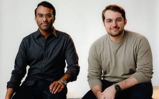 Tome co-founders Keith Peiris and Henri Liriani pose for a photo together.