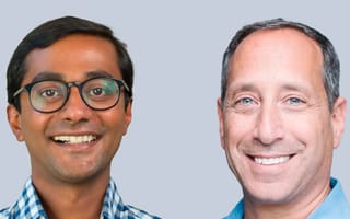 Regie’s co-founders Srinath Sridhar, CEO, and Matt Millen, President, pose for a photo.