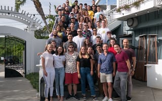 StackCommerce employees pose together during a team outing.