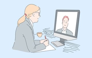 woman interviewing a male job candidate virtually