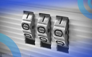 A combination lock on a briefcase set to triple zeros