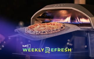 An Ooni oven cooking a pizza.