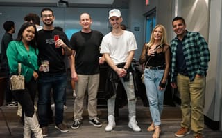 Members of the Tapcart team pose in the office