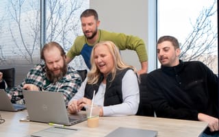 A group of KPA employees working on a project.