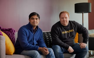 Rippling co-founders Prasanna Sankar (left) and Parker Conrad (right) pose together for a photo.