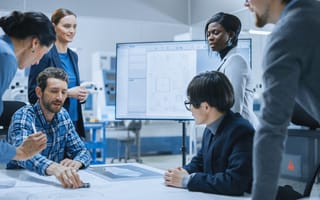 stock photo of employees collaborating
