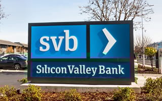 Silicon Valley Bank Collapse: How Tech Companies Helped Others During a Chaotic Weekend A sign for Silicon Valley Bank in a parking lot.