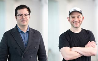 Character.AI co-founders Daniel De Freitas and Noam Shazeer pose for photos.