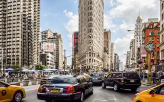 A view of the Flatiron Building from Fifth Avenue in New York City.
