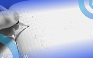 A closeup of a person working on math in a notebook with a pencil