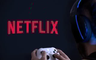 A person holding a gaming controller with the Netflix logo on the TV.