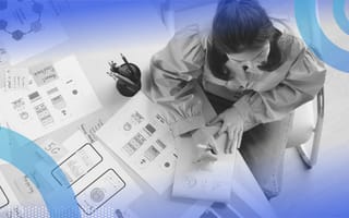 A person working on a mobile design. AI can help personalize and automate design.