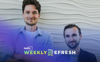 Roboto AI co-founders stand side-by-side against a white textured background.