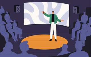 Tech leader gives presentation on stage in front of audience