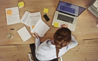 Woman at a desk with papers