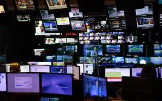 A photo of the media room at NBCUniversal, featuring hundreds of screens