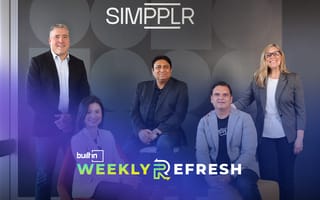 Simpplr employees pose together for a photo.