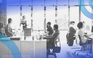 People working in an office. Organizations must help employees prepare for the future of work.