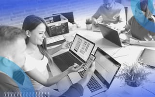 How to Overhaul Your Site’s UX Without Breaking Everything A group of UX designers work on a laptop and mobile device