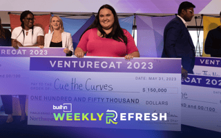 Charlotte Oxnam, the CEO and founder of Cue the Curves, stands onstage with an overside check from winning VentureCat.