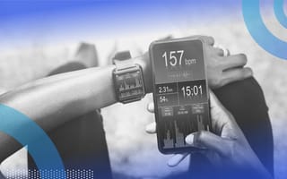 A woman checking her heart rate. AI-powered fitness and health apps can help achieve greater well-being.