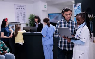 doctor with computer in healthcare setting