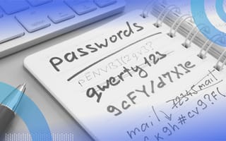 A notebook with the word “Passwords” and several passwords crossed out