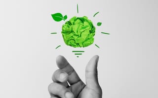 A green ball appears over a hand.