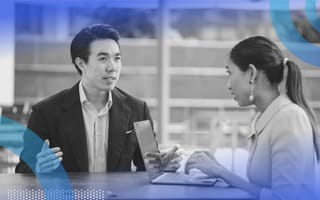 An employee in a performance review. Posture can help you be more confident during these important meetings.