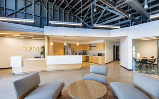 The interior lobby of FlexHQ's coworking space.