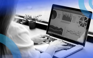 person creating graphs on computer