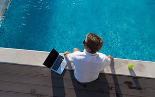 photo of man by pool