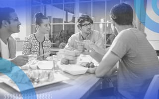 An office lunch gathering. Workplace food programs can encourage retention, collaboration and employee engagement.