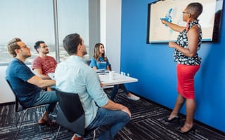 Telesign employee presenting to small group