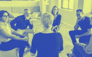 employees sitting in a resource group