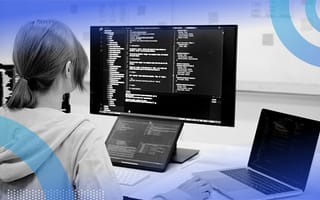 How to Fix the GitHub Error ‘Remote Host Identification Has Changed’ software developer writing code with two computers