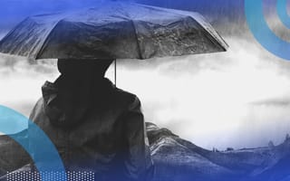 A person in a storm. CEOs and CHROs can navigate uncertainty with a little bit of planning.