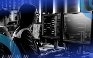 A cybersecurity engineer works at a computer terminal