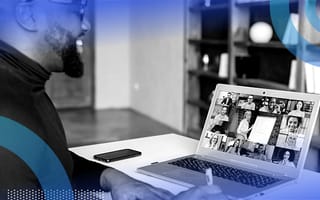 Remote engineer taking notes during a virtual team meeting