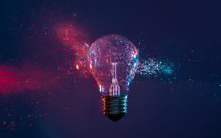 A colorful artist rendering of a lightbulb shattering.