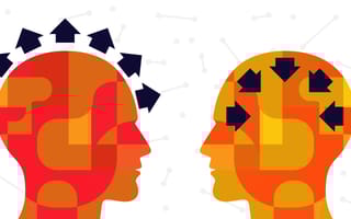 An illustration of two heads, one with arrows pointing out and the other with arrows pointing in, to symbolize introverts and extroverts.