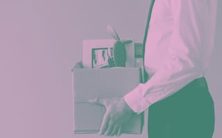 terminated employee carrying a box of their stuff