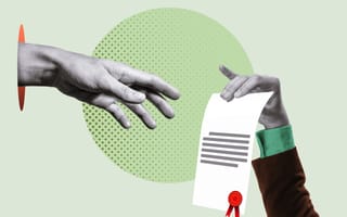 A hand reaches for a HR certification held by another hand.