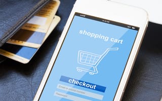mobile shopping concept - virtual shop on phone screen with credit cards