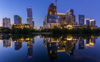 A nighttime photo of the Austin skyline.