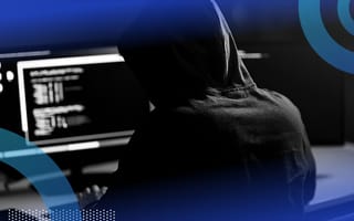hooded hacker on a computer