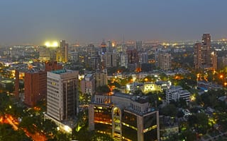 A nighttime aerial view of New Delhia, India's capital city within the territory of Delhi.