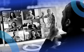 A person using sign language on a Zoom call with other people also using sign language.